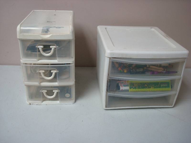 lot 100 image: Two Small Bins With Some items Inside, Show WearTwo Small Bins With Some items Inside, Show Wear