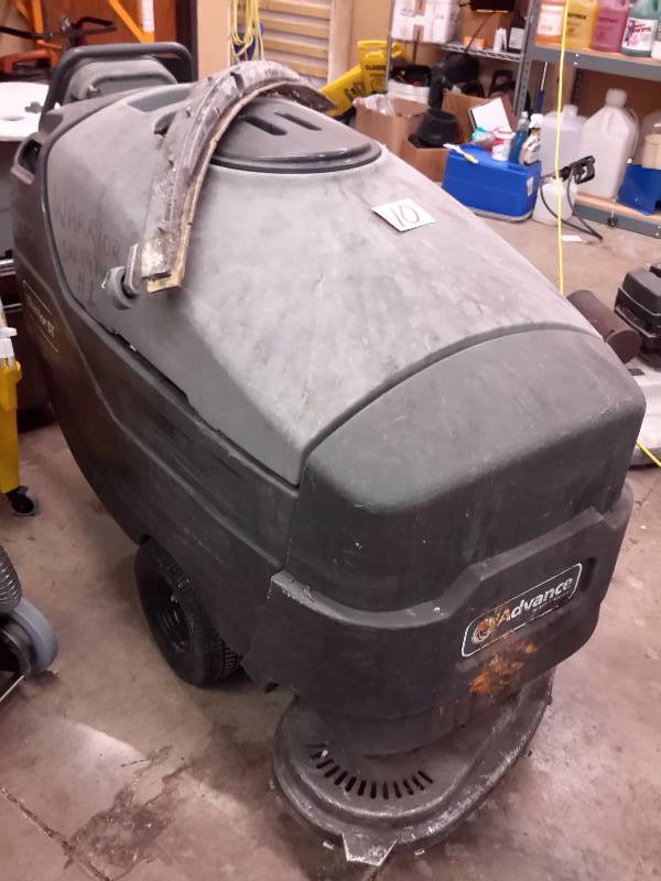 lot 10 image: ADVANCE, 28 in Warrior  Scrubber. ST Built in Charger.. NO BATTERIES.. Model 28D  Part no.  56315036