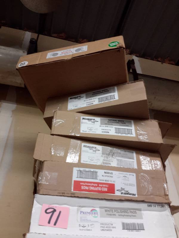 lot 91 image: 5 Cases, Niagara Red  and Natural Floor machine and Burnishing pads