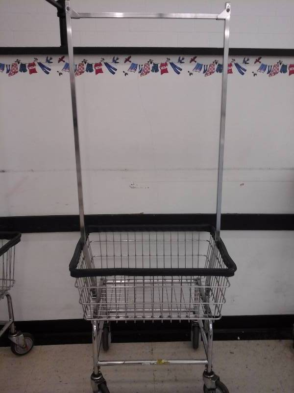 lot 9 image: 4 wheel laundry basket