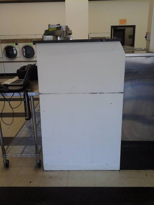 lot 408 image: Wood Cabinet(Hiding back of washers)