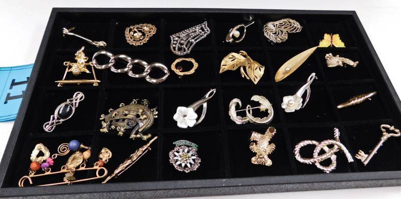 24 brooches display not included