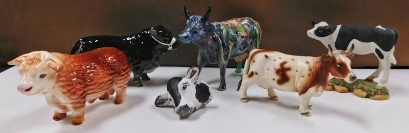 lot of bull figurines more colorful