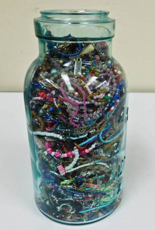 large vintage ball jar filled with beads