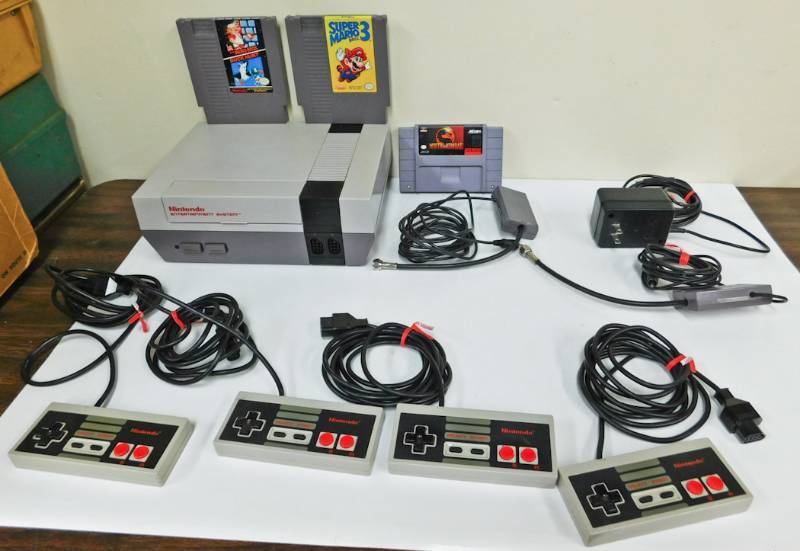 vintage NES with controllers games
