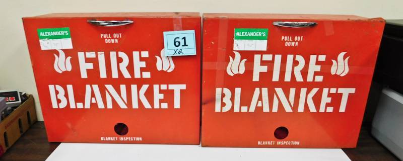 2 red metal boxes with fire blanket