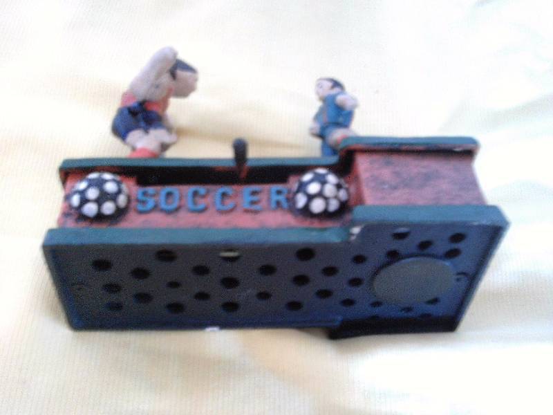 COLLECTIBLE CAST IRON SOCCER BANK