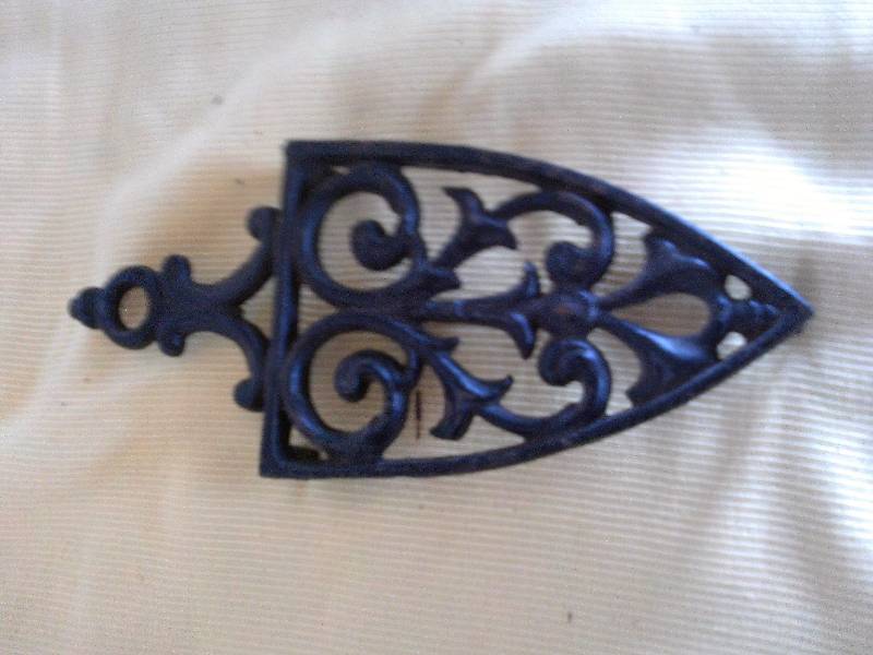 ANTIQUE CAST IRON TRIVET