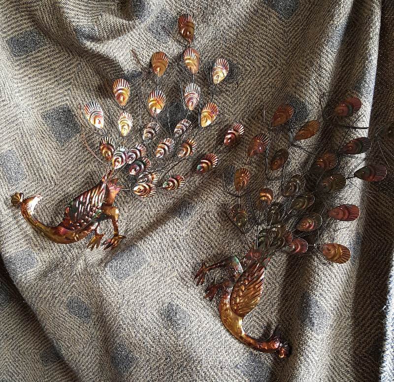 Lot of two metal peacocks wall decorations