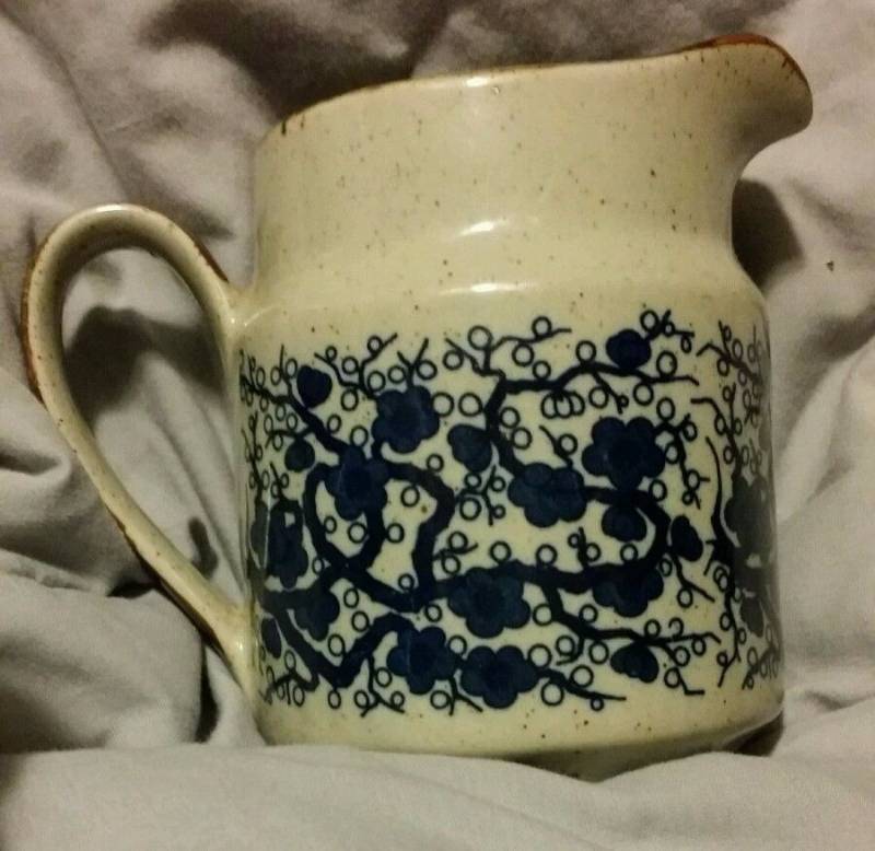 Vintage hand painted pitcher with handle and blue flowers