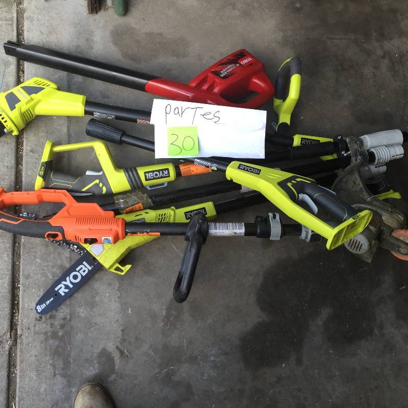 lot 30 image: Lot of trimmer and Pole Chainsaw for parts o repair