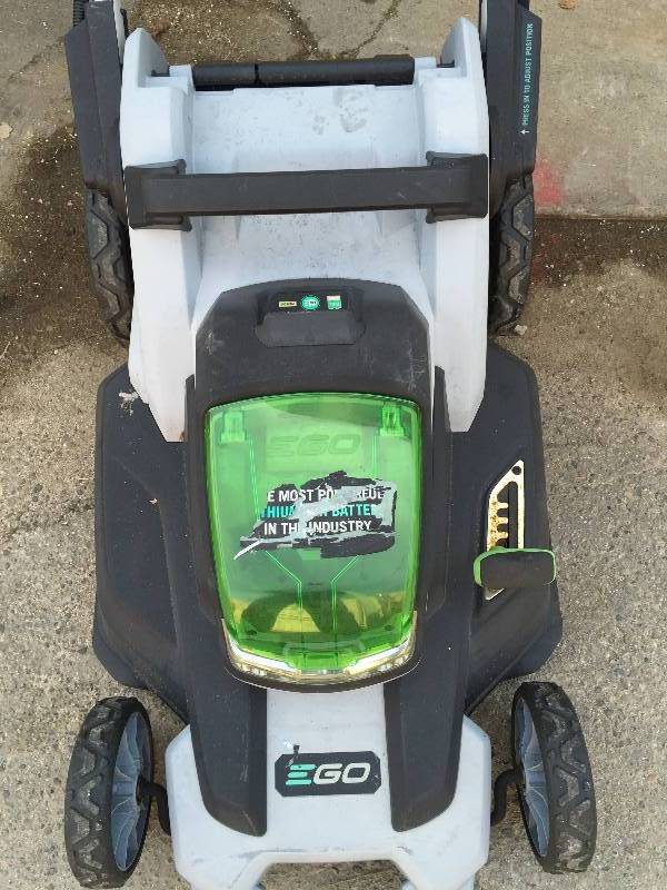 lot 38 image: Ego 20 in. 56-Volt Lithium-ion Cordless Lawn Mower battery and charger are include  ,misig key to star