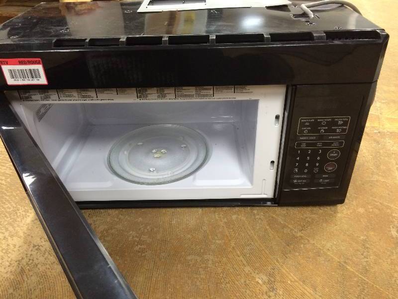 magic Chef 1.6 cu. ft. Over-the-Range Microwave in black working ...