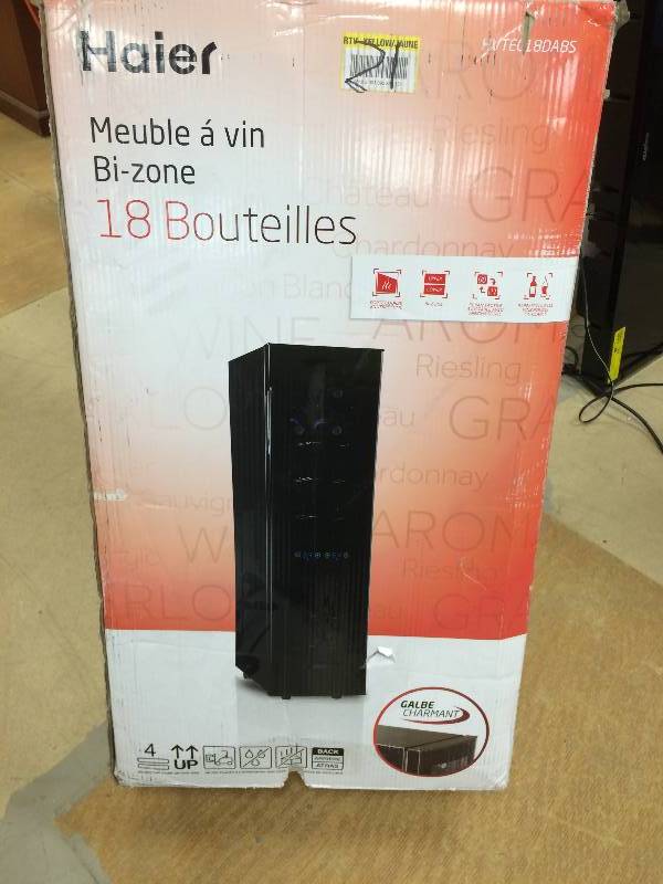 lot 21 image: Haier 18-Bottle Dual Zone Wine Cellar with Electronic Controls in Black Model # HVTEC18DABS New