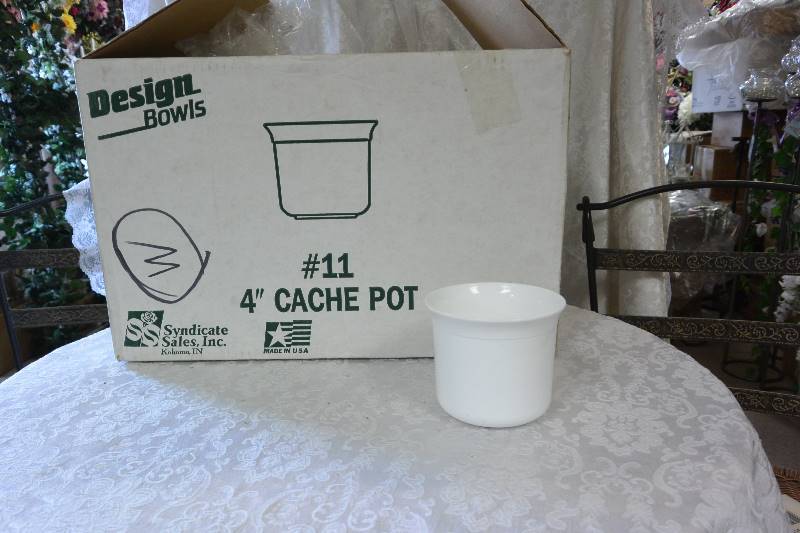 Plastic Design Cache Pots