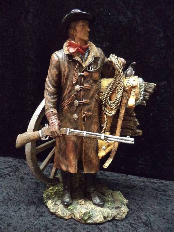 resin cowboy statues