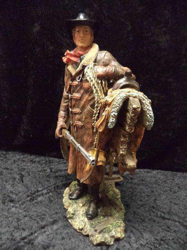 resin cowboy statues