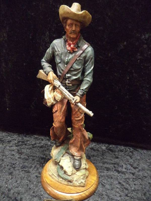 resin cowboy statues