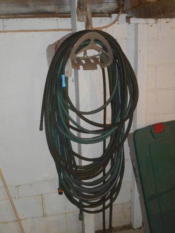 lot 86 image: Hose Rack With (3) Garden Hoses ...