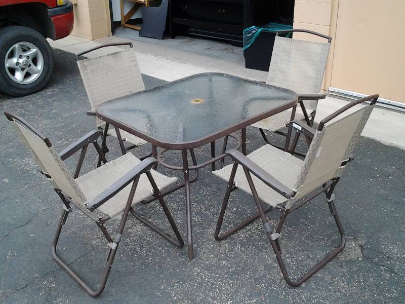 lot 2 image: Glass Top Patio Table 38x32 With 4-Folding Chairs