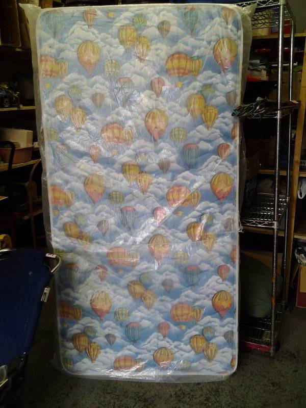 lot 8 image: Twin Size Mattress  (Never Used)