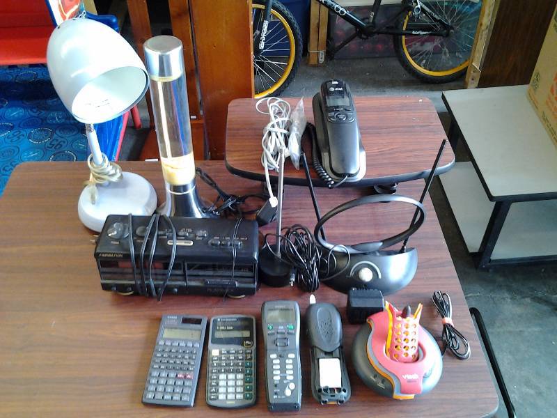lot 30 image: Radio, Assorted Phones, Calculators, Lava Lamp, Antennas
