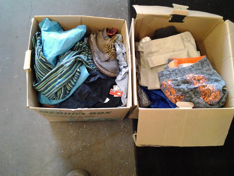 lot 34 image: 2 Boxes Of Mens Clothing Pants, Dress Shirts, More 36x32, Size Large Shirts