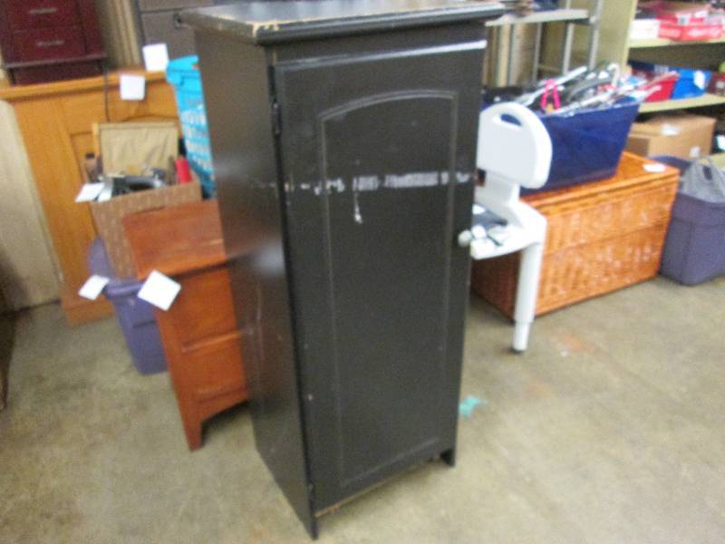 Black wooden 4 foot garage cabinet...