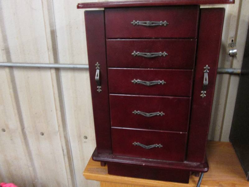 Cherry colored wood jewelry armoire...
