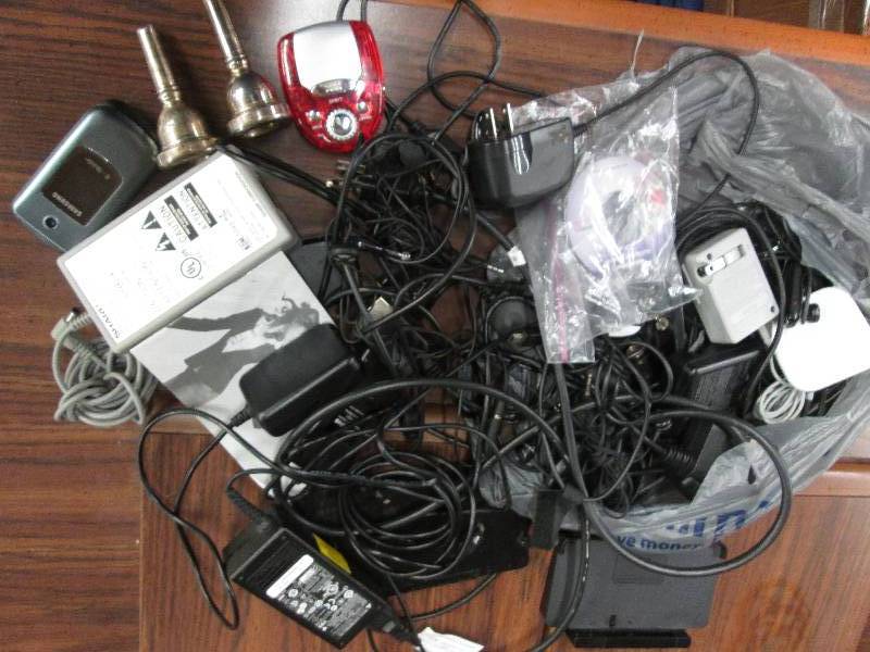 Assorted electronics cabling, cell ...