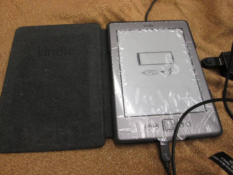 Kindle with cover ...