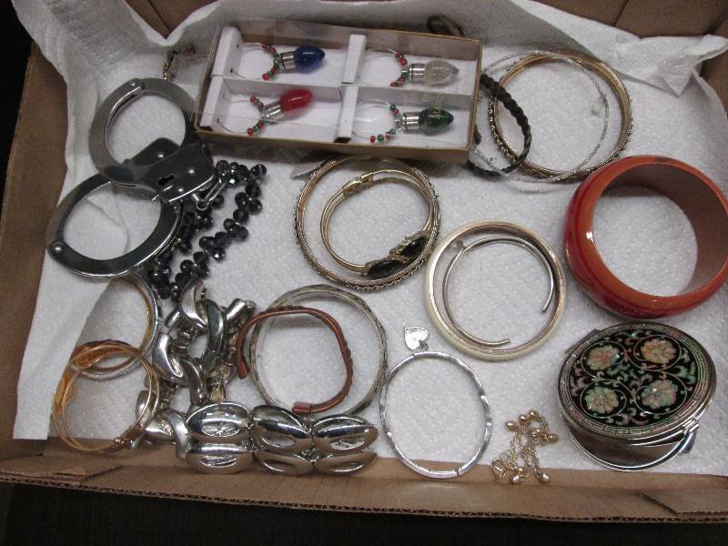 Lot of assorted bracelets, handcuff...