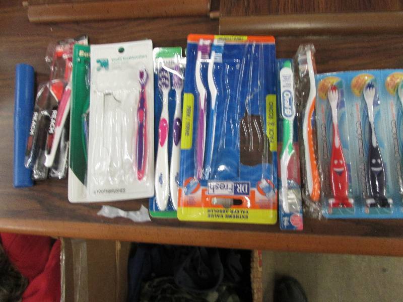 Lot of assorted toothbrushes, bath ...