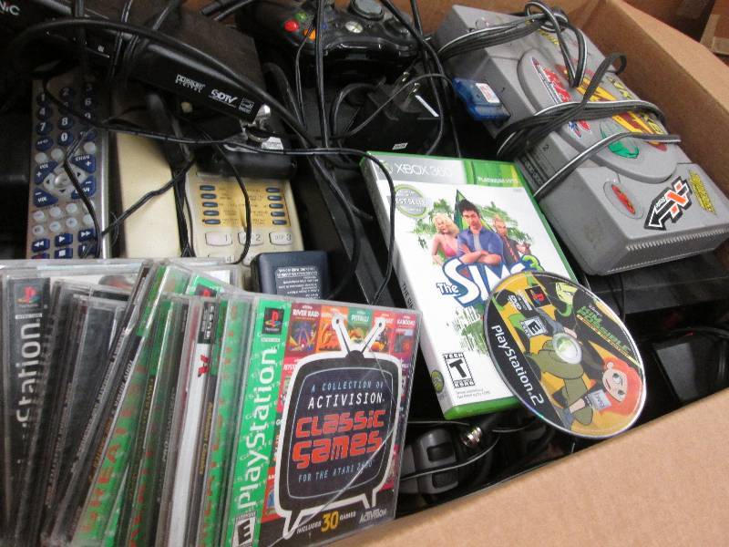 Sony Playstation with games, VHS pl...