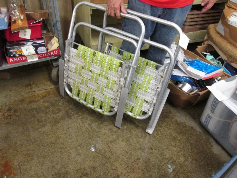 2 metal webbed lawn chairs...