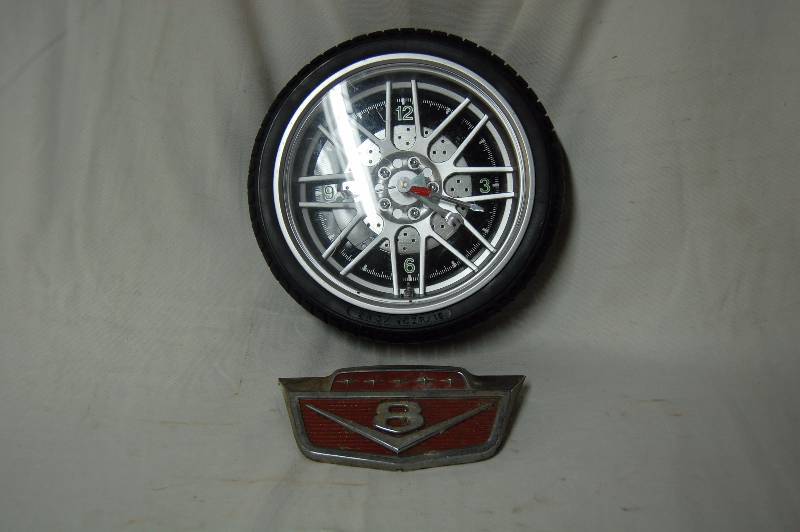 Clock and Ford Emblem