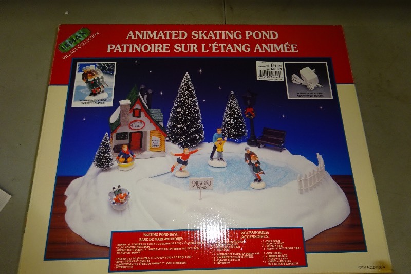 lot 32 image: Lemax Animated Skating Pong