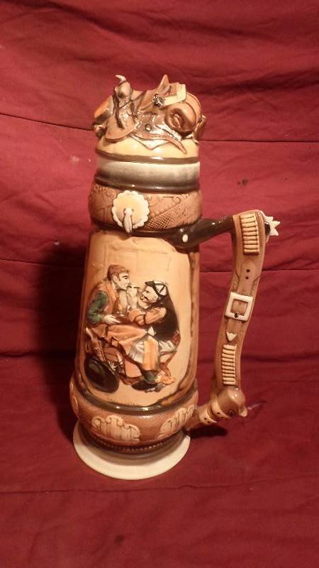 lot 33 image: 14 Norman Rockwell Beer Stein