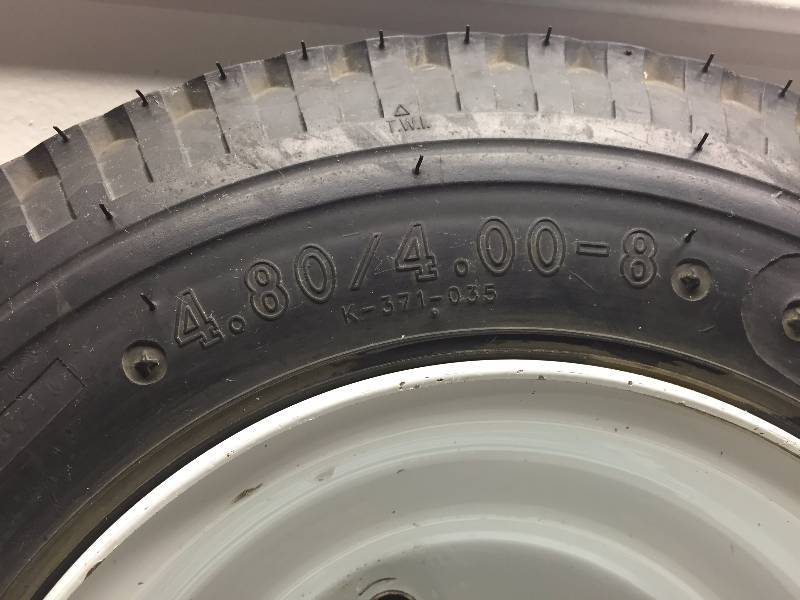 lot 39 image: LOADSTAR 4.804.00-8 TIRE AND RIM - TIRE HAS DAMAGE