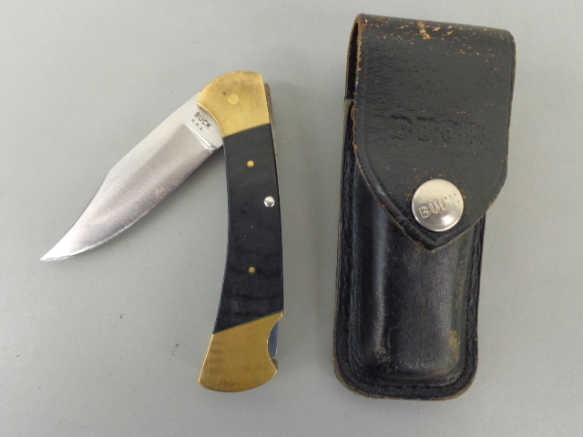 lot 53 image: Buck Knife & Sheath
