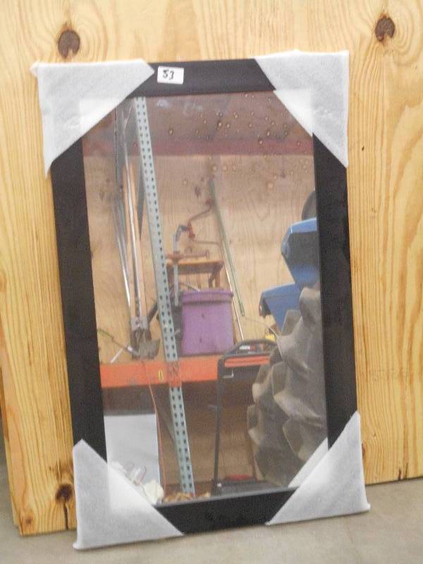 lot 53 image: Unused 24x36 Black Wood Frame Mir...