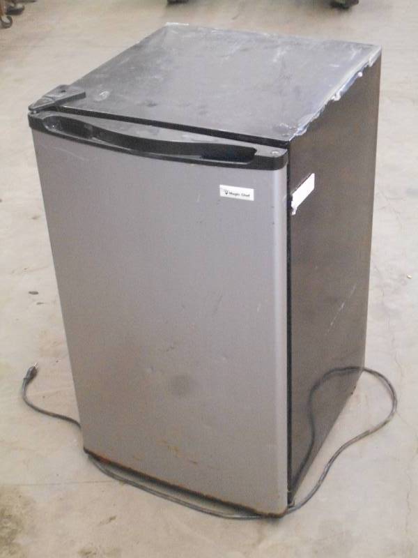 lot 57 image: Magic Chef Mini Fridge With Interio...