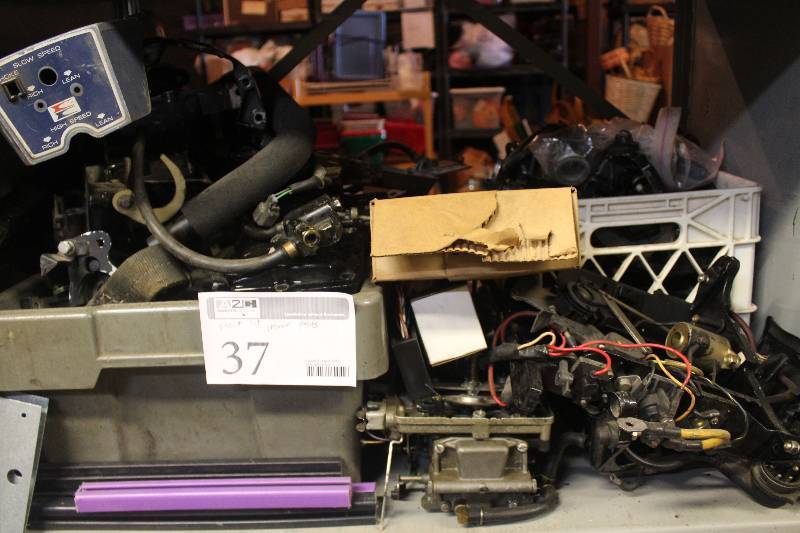 lot 37 image: Shelf Lot of Boat Motor Parts