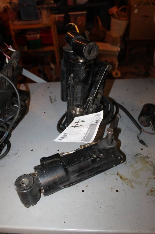 lot 44 image: Lot of (3) Mercury Outboard Boat Motor Power Tilt Ram