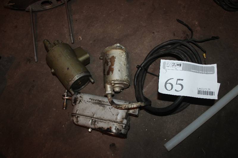 lot 65 image: Lot of (3) OMC Tilt Parts