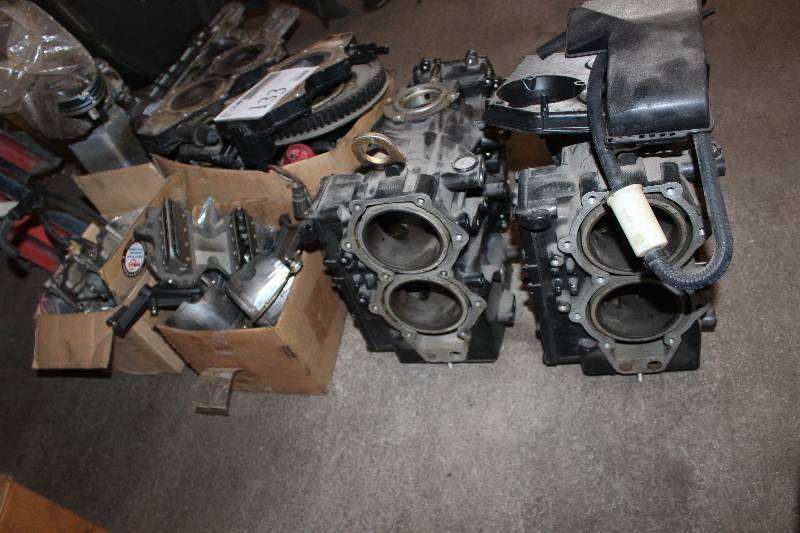 lot 133 image: Lot of (3) Boxes of JohnsonEvinrude Late 80sEarly 90s 40 hp Powerhead Parts