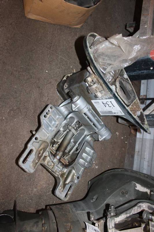 lot 134 image: 1980s OMC 40hp Outboard Boat Motor Short Shaft Exhaust Housing and Transmission Bracket
