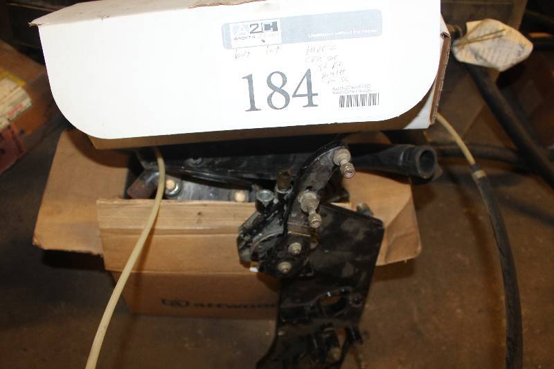 lot 184 image: Box Lot of MerCruiser Shift Plates and Misc Parts