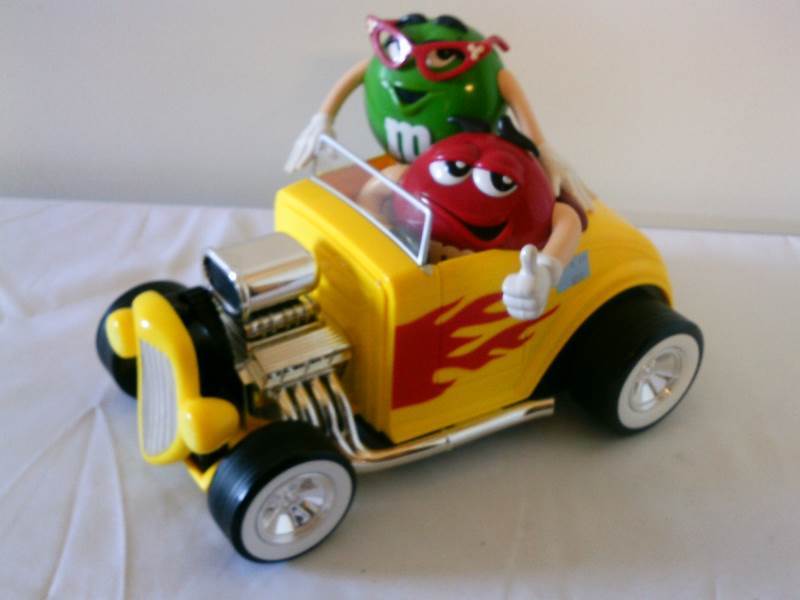 lot 23 image: M&M Hot Rod Rumble Seat Candy Dispenser
