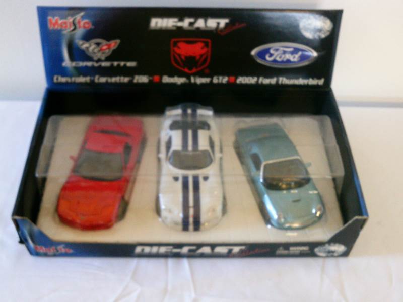 lot 26 image: Maisto DieCast Cars, (set of 3)